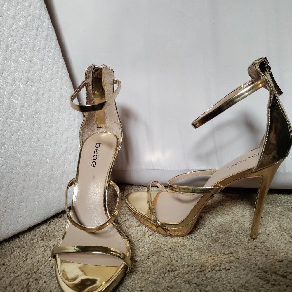 Gold Bebe strappy high-heels